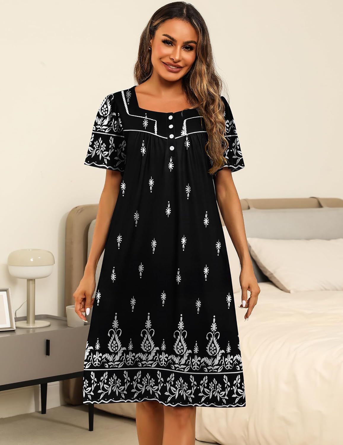 Black house dress with white print, square neckline, button front, short sleeves