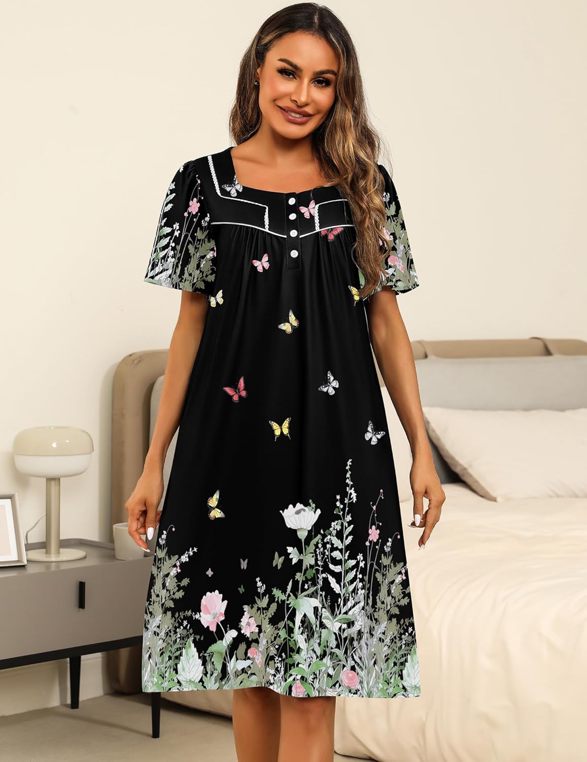 House dress in black with button-front square neckline and colorful butterfly floral print