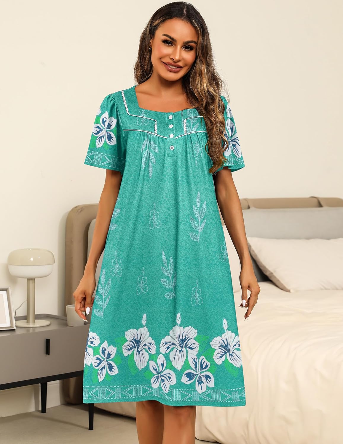 House dress in teal green with white floral print and button-front square neckline