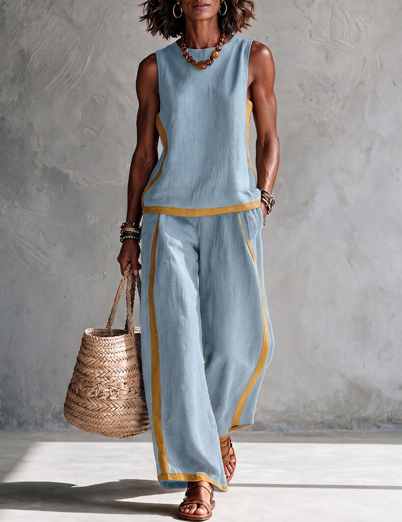 Light blue sleeveless top and wide-leg pants set with gold contrast trim