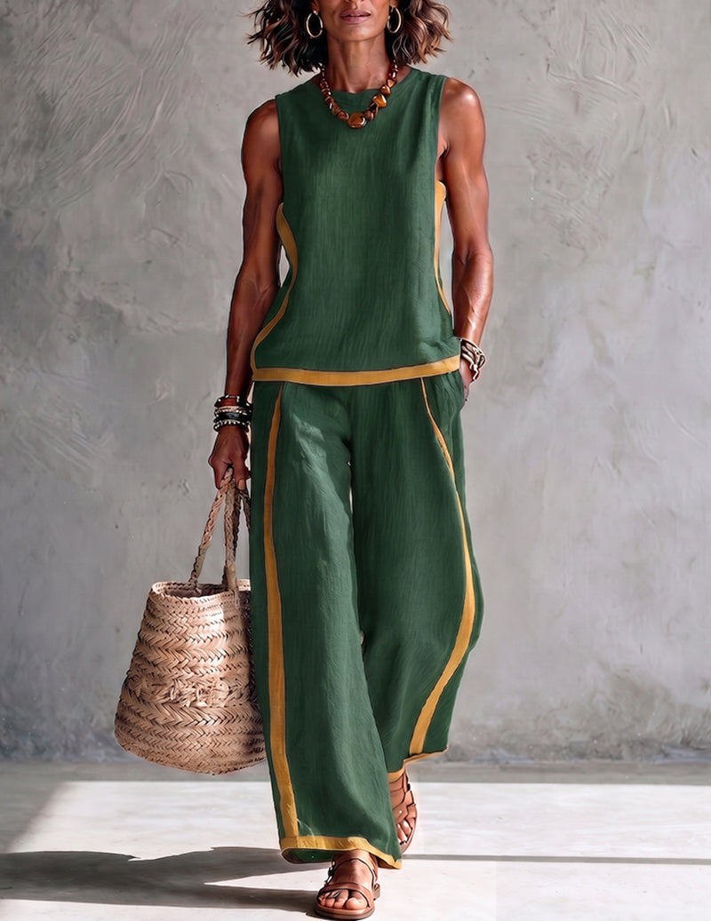 Dark green sleeveless top and wide-leg pants set with gold contrast trim