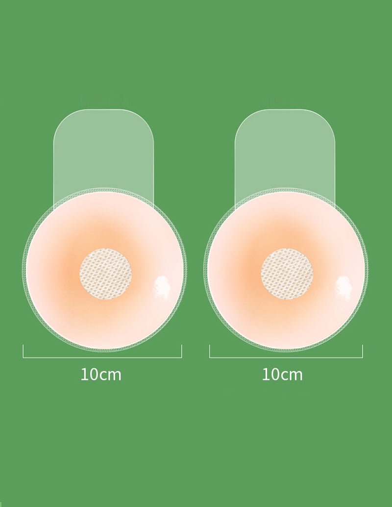 Pair of reusable nipple covers, larger beige pads with mesh center, 10 cm.