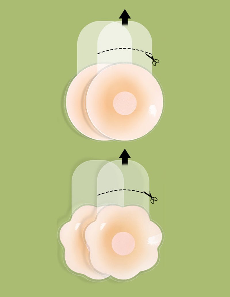 Curved reusable nipple cover, beige pad with mesh center shown from the side.