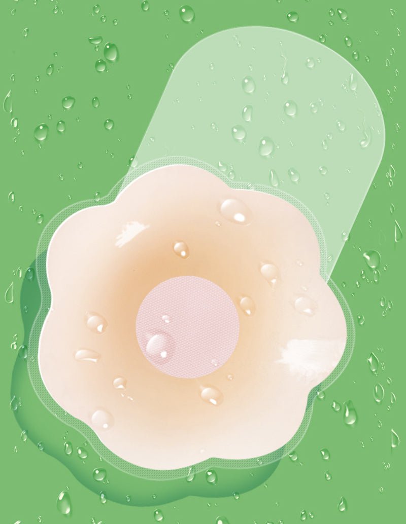 Reusable nipple cover, beige semi-sheer pad with mesh center.