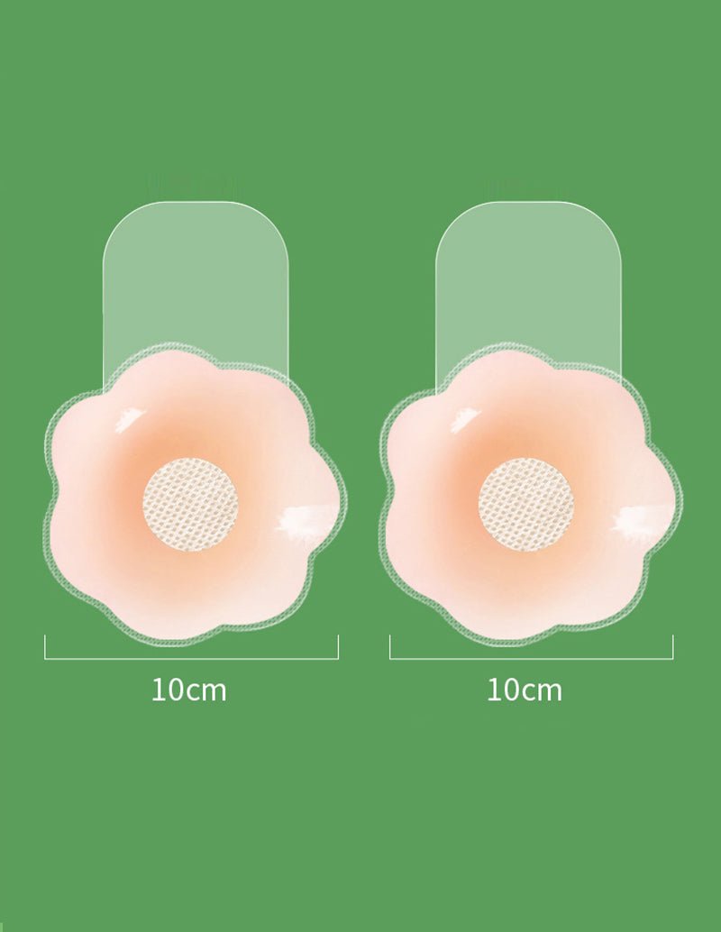 Pair of reusable nipple covers, flower-shaped beige pads with mesh center, 10 cm.