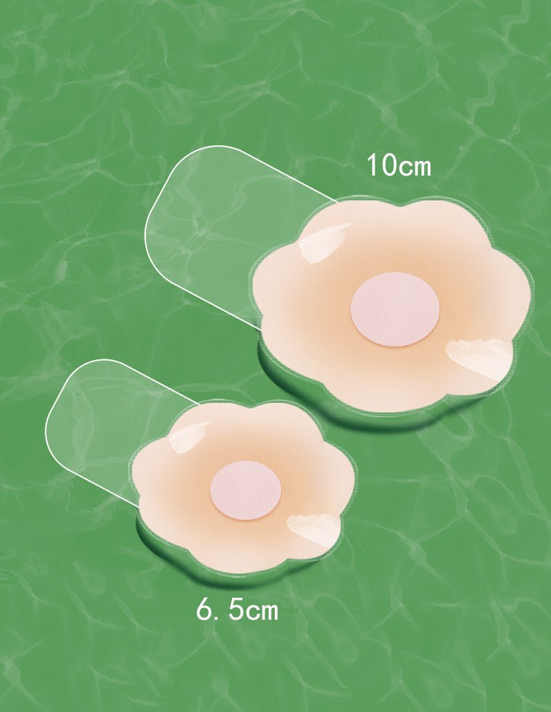 Curved reusable nipple covers, beige pads with mesh center, 6.5 cm and 10 cm.