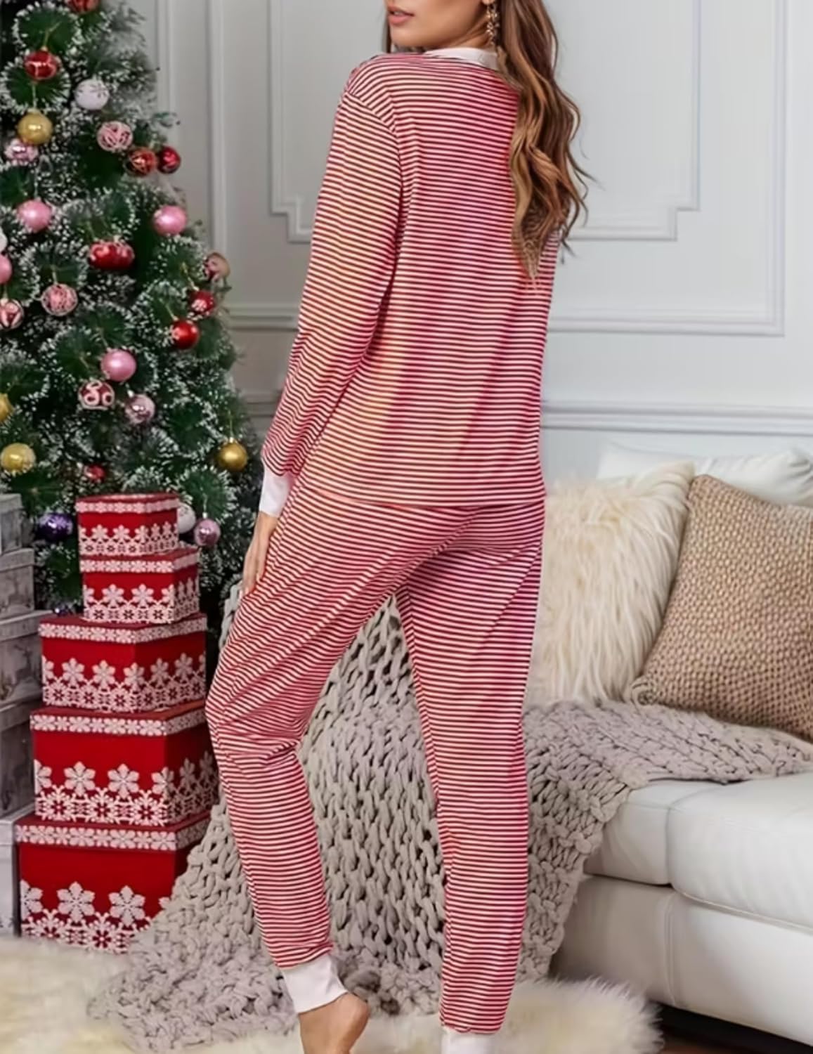 Red-and-white striped long-sleeve pajama set with V-neck top and fitted jogger pants
