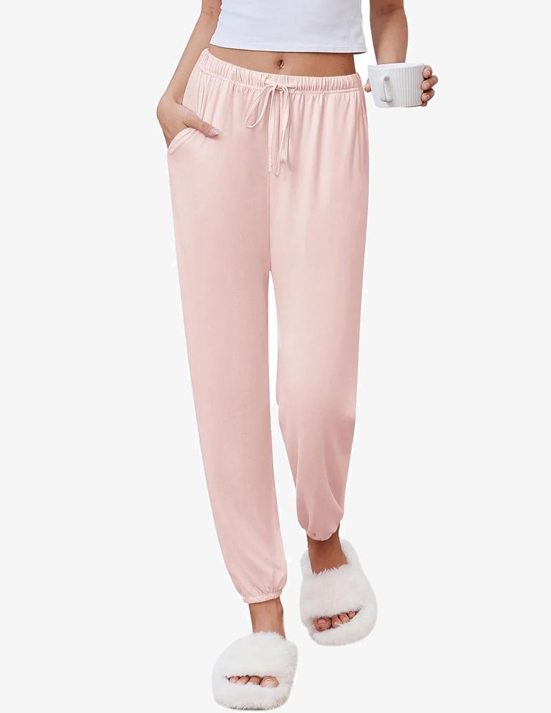 Light pink lounge jogger pants with drawstring elastic waist and tapered ankle cuffs