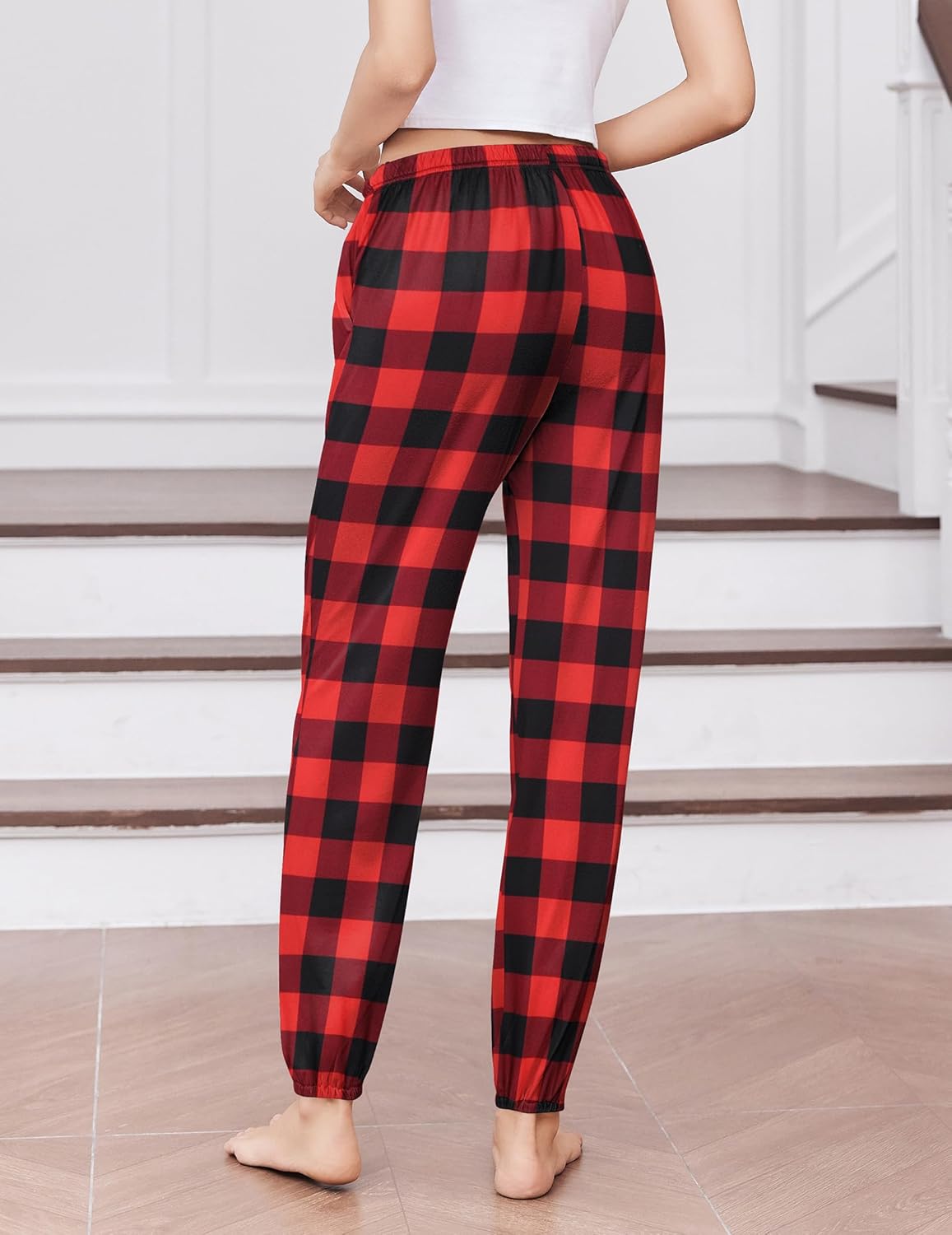 Red and black plaid lounge jogger pants with drawstring elastic waistband and cuffed ankles