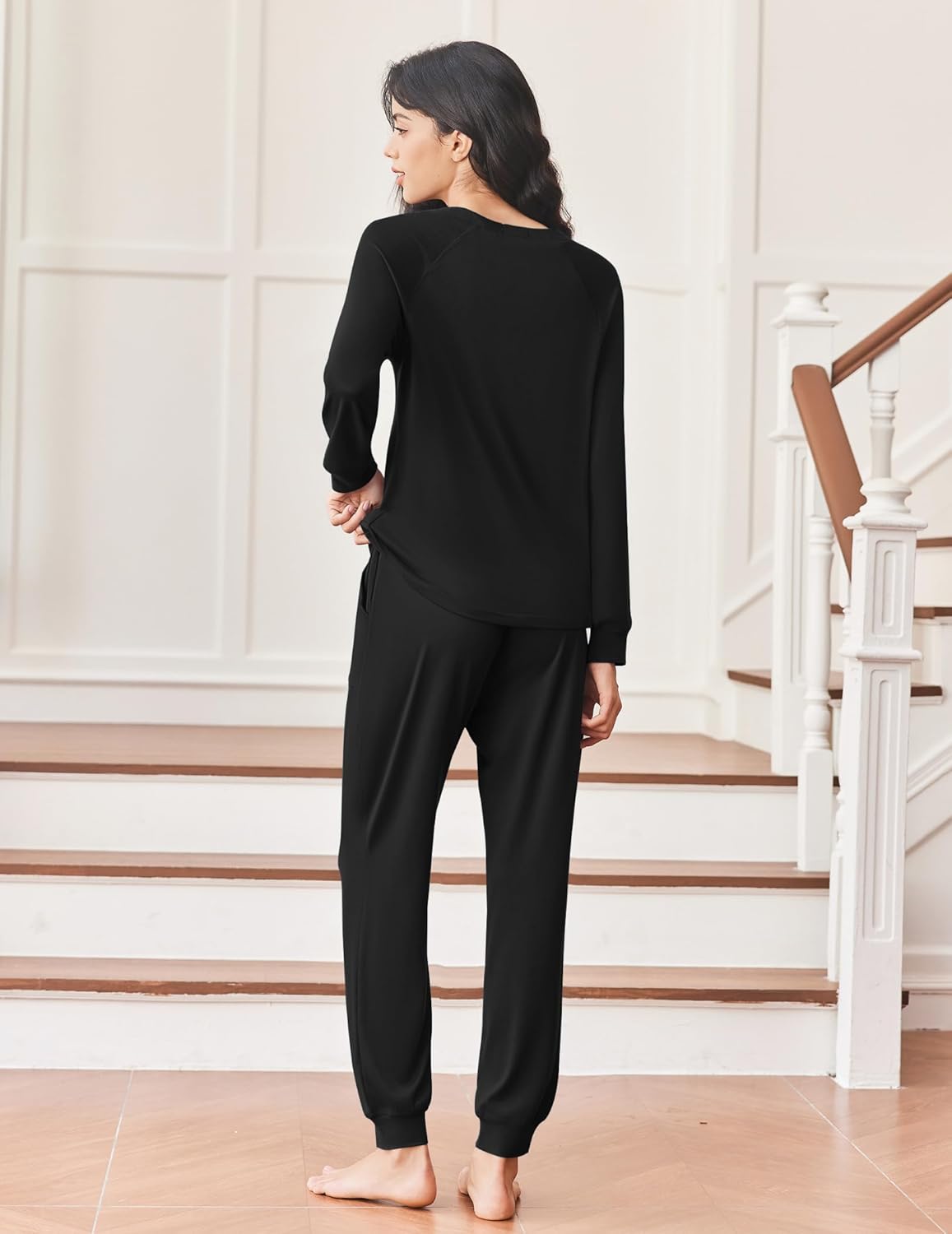 Black 2-piece pajama set from back view, long-sleeve top and tapered joggers