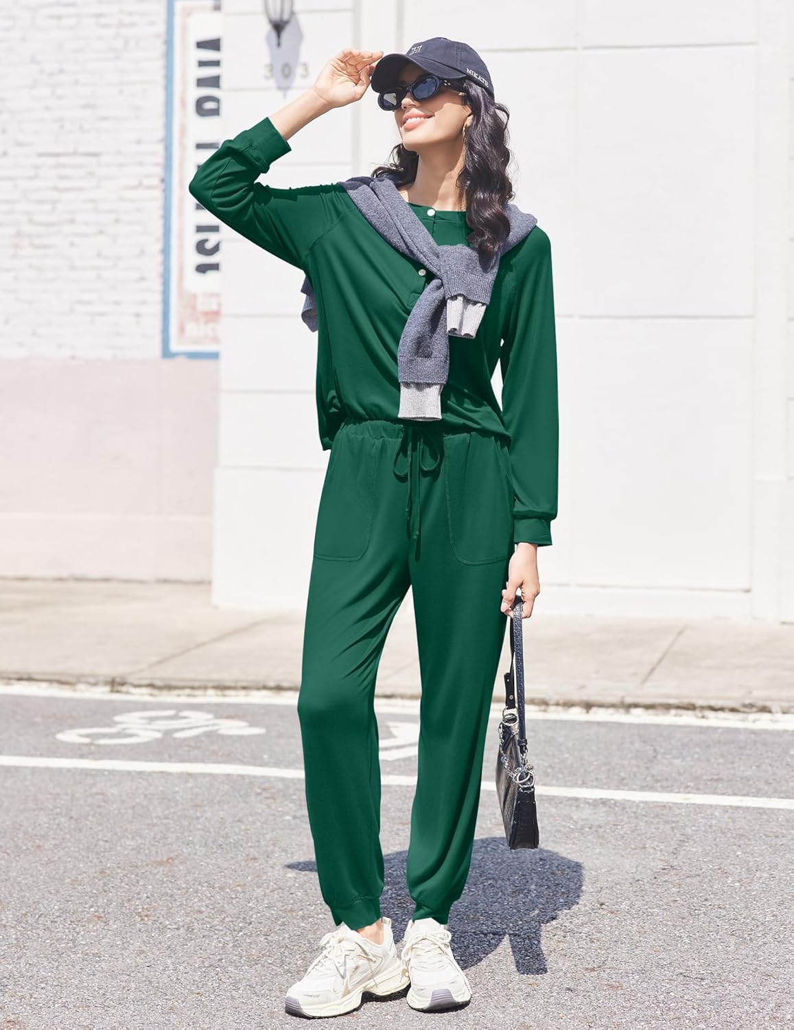 Green jogger set outdoors: drawstring pants and long-sleeve button henley top