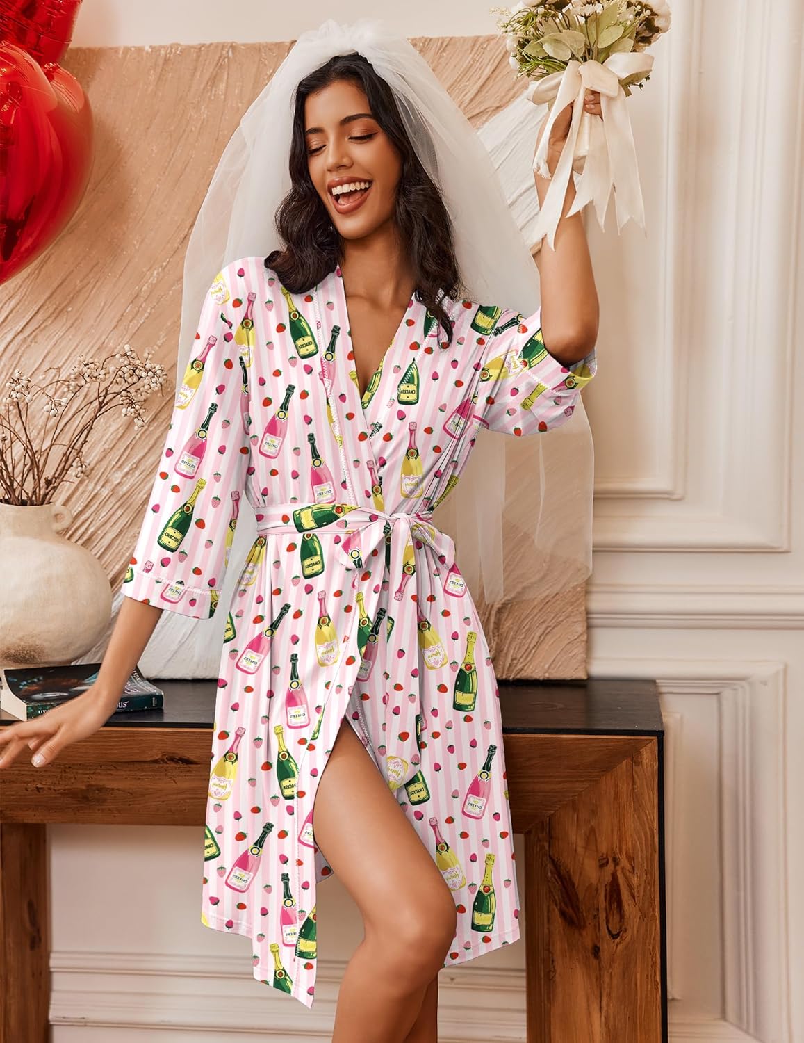 Knee-length bathrobe kimono with 3/4 sleeves, floral print, tie belt and V-neck trim