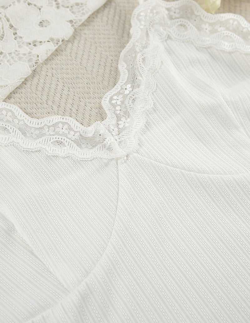 White lace patchwork knit bodice with scalloped lace edges and curved neckline