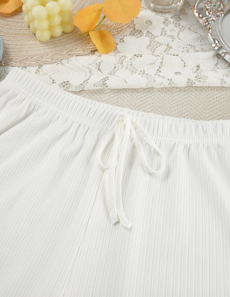 White knit lounge set skirt with elastic waistband and white drawstring