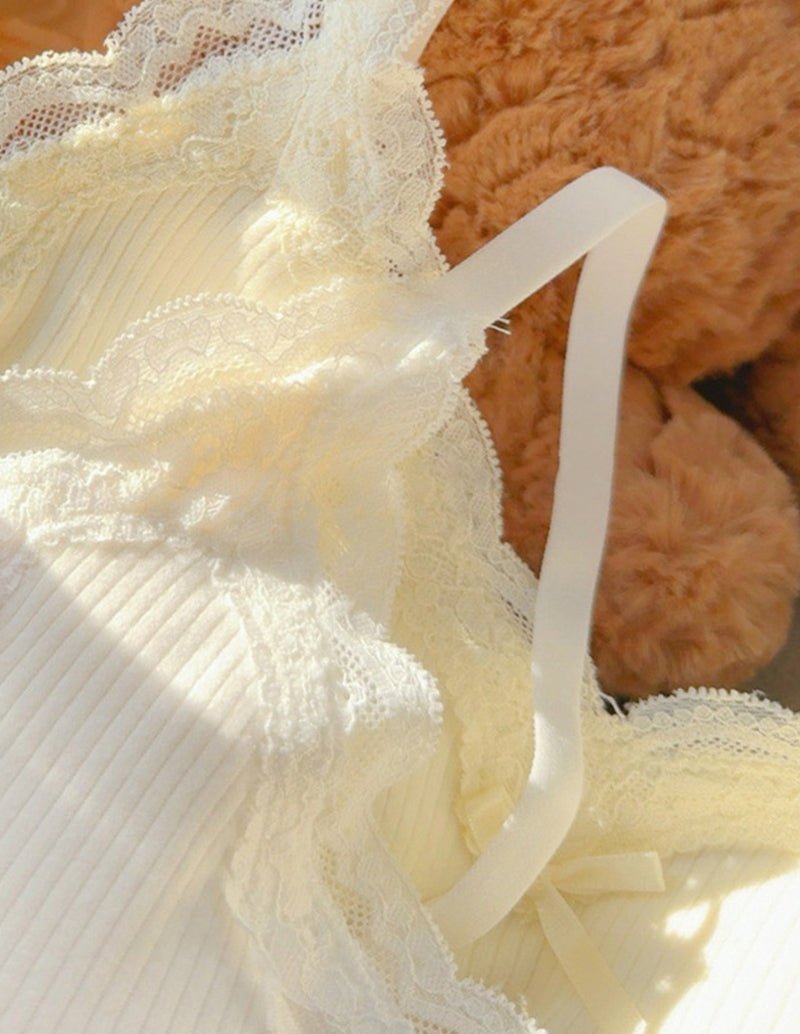 Off-white lace overlay with scalloped trim on built-in bra camisole