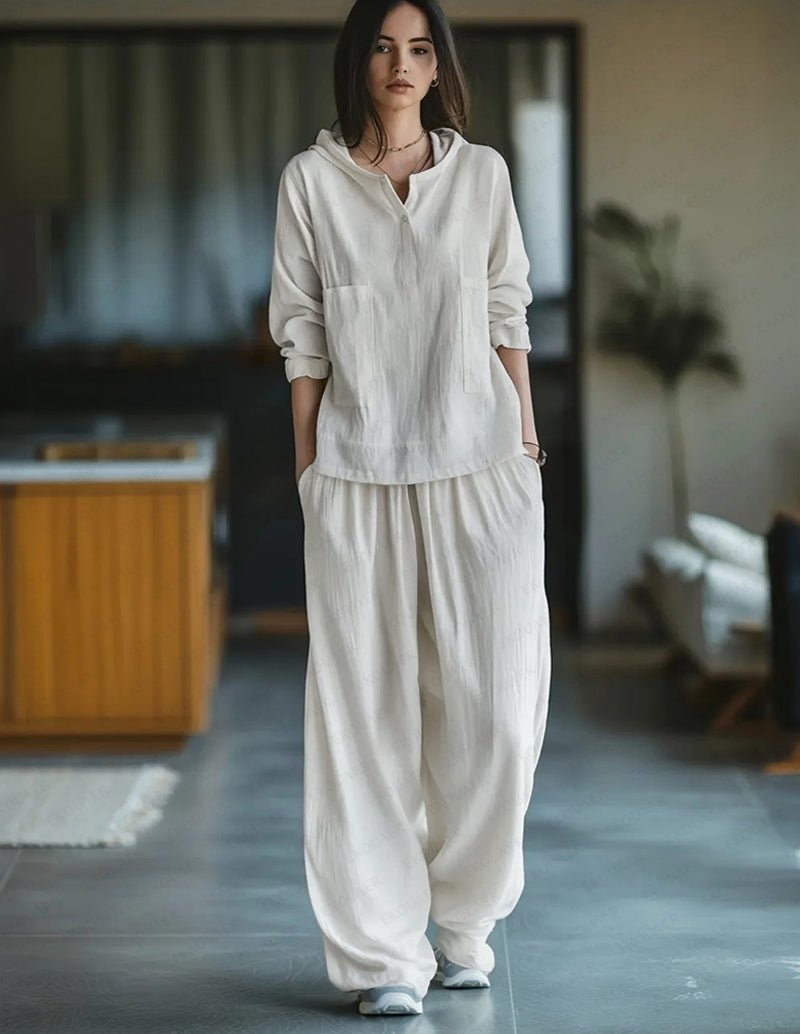 White cotton two-piece set with hooded pullover and relaxed jogger pants
