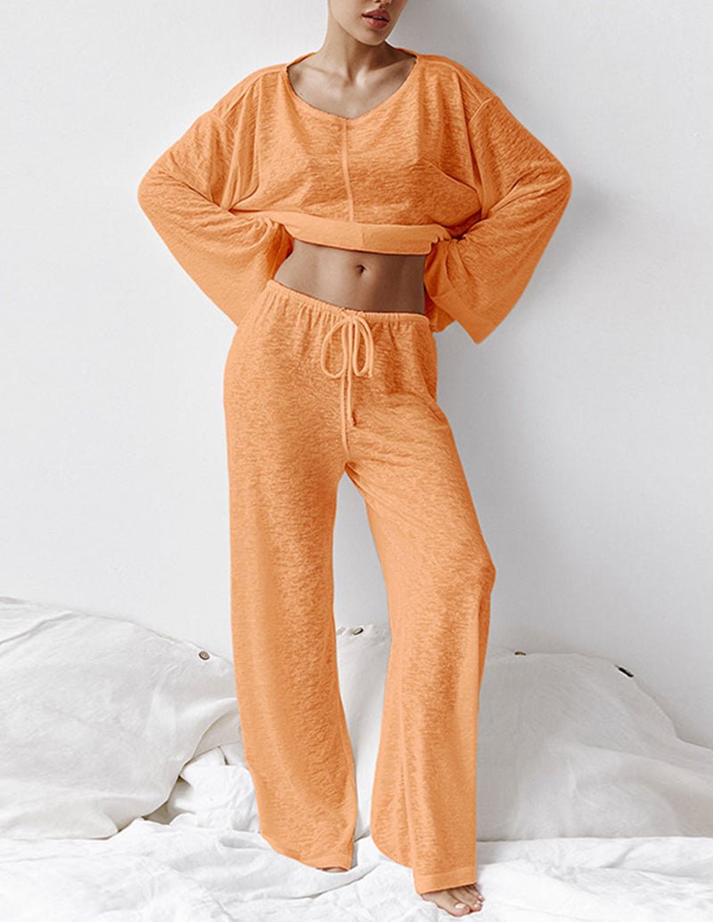 Orange knit loungewear set with long sleeves and drawstring pants