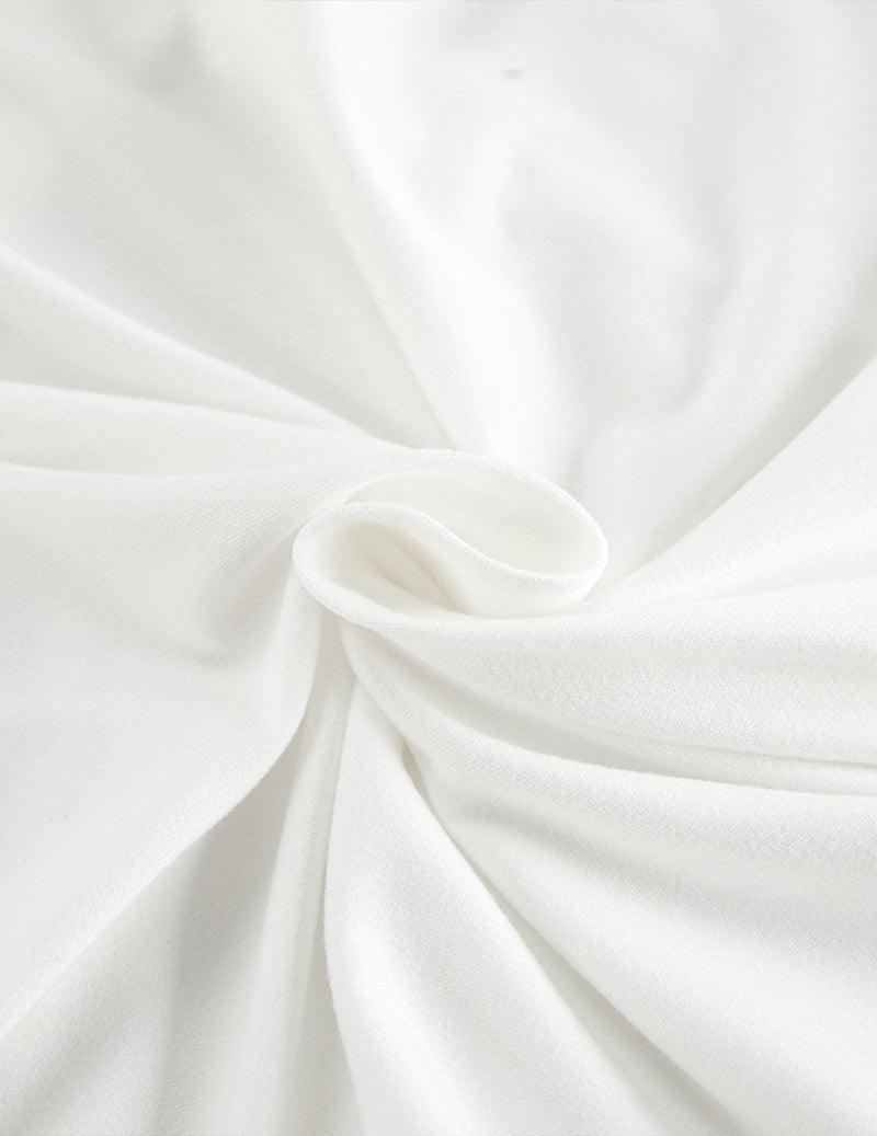 White 3-piece wrap pajama set, close-up fabric detail