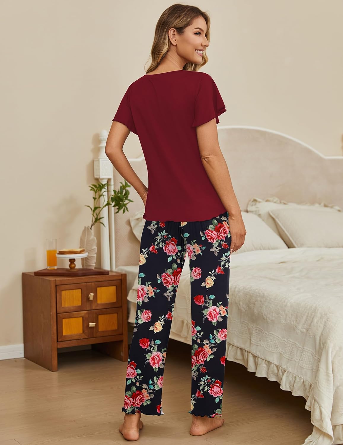 Two-piece lounge set: burgundy V-neck top with dark floral wide-leg long pants