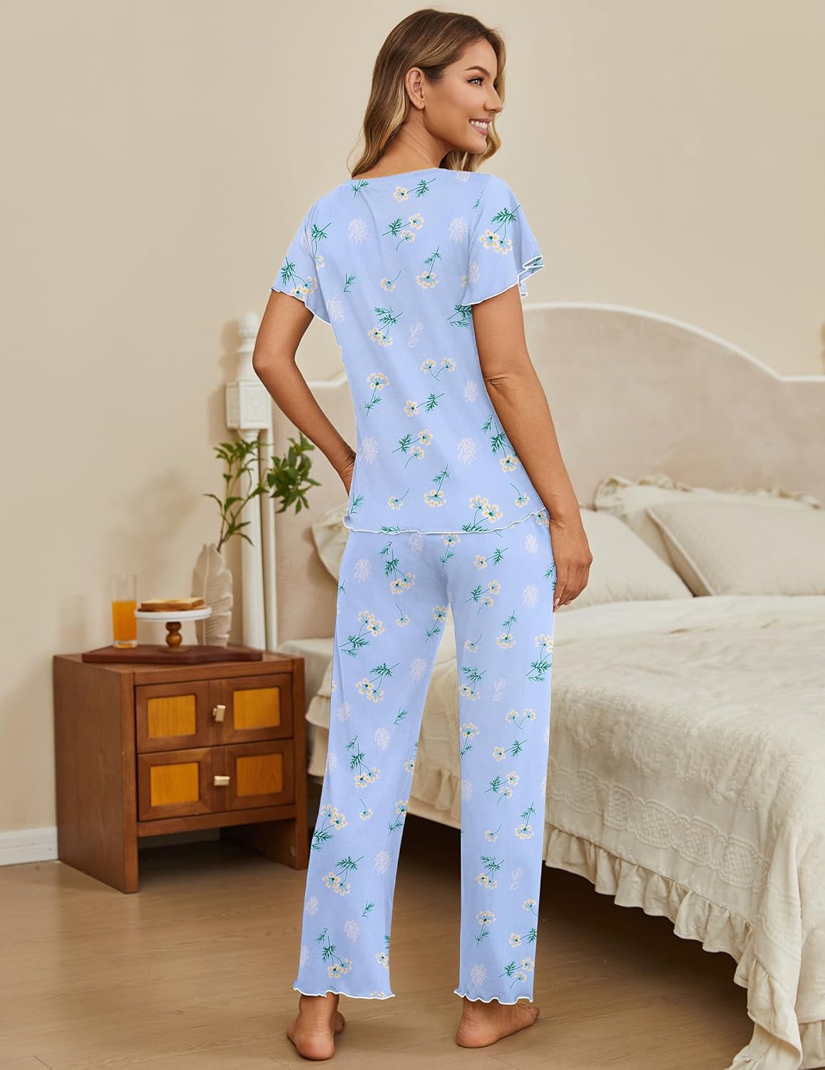 Two-piece lounge set: light blue printed V-neck top with matching long pajama pants