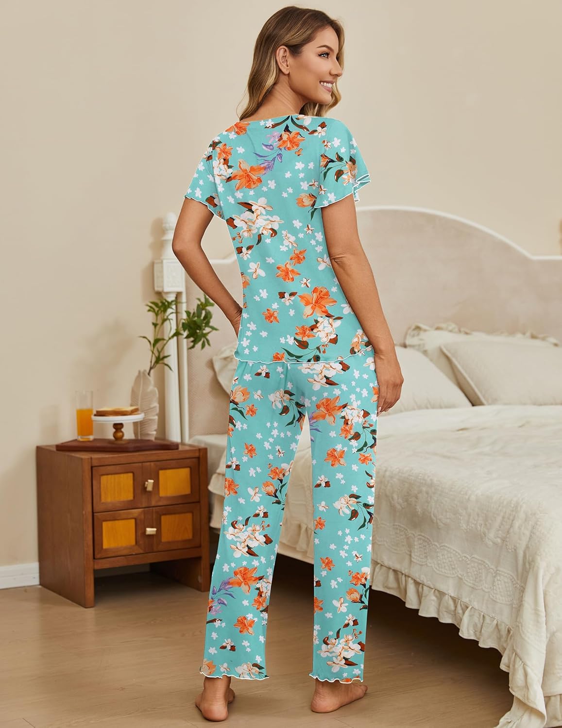 Teal floral 2-piece lounge set with short-sleeve top and long pants, back view