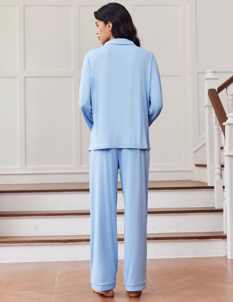 Light blue pajama set shown from back: long-sleeve top and matching pants
