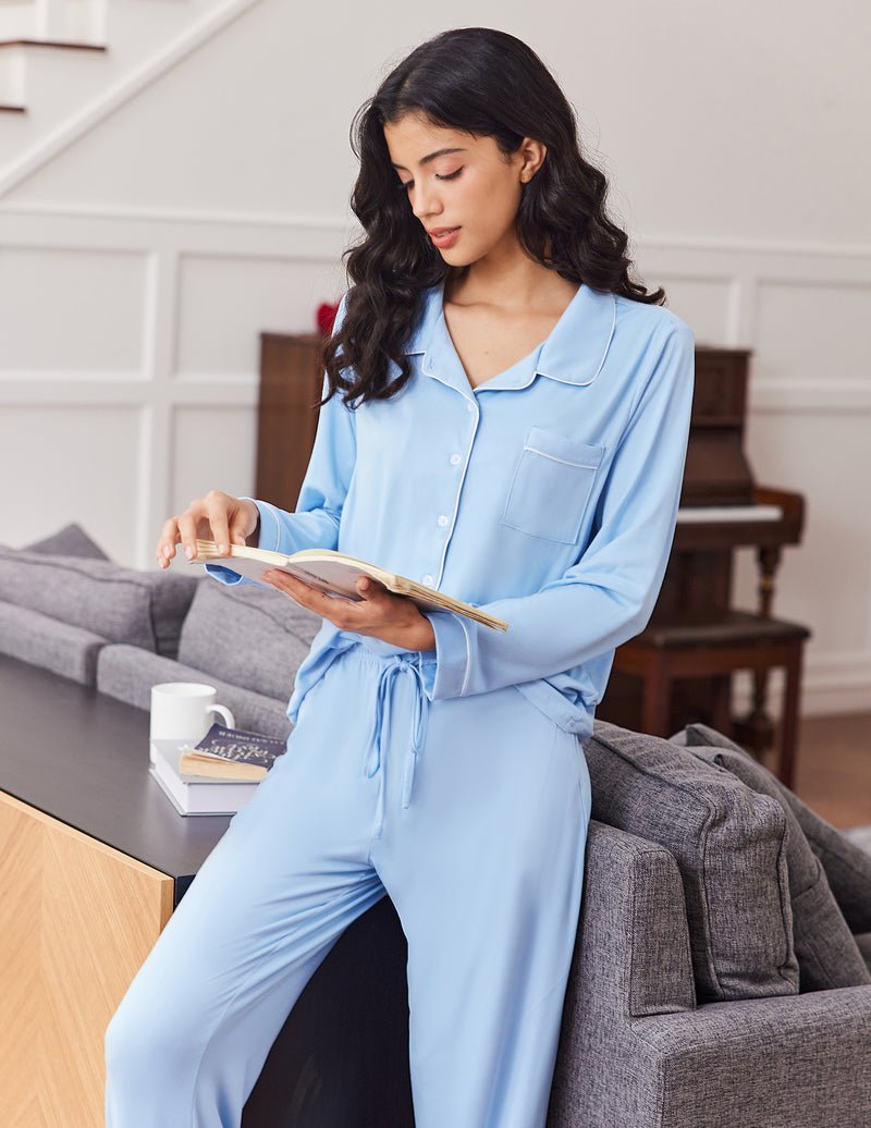 Light blue button-front pajama set with chest pocket and gathered drawstring waist