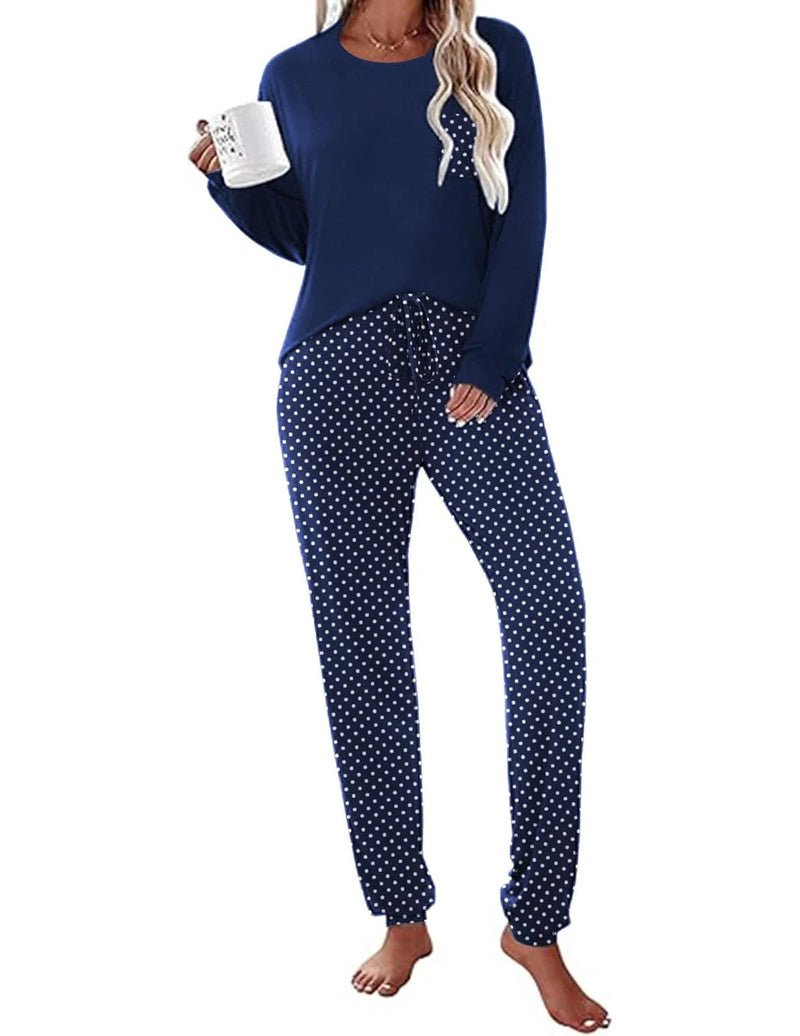 Long Sleeve Christmas PJ set with navy top and navy pants with white polka dots