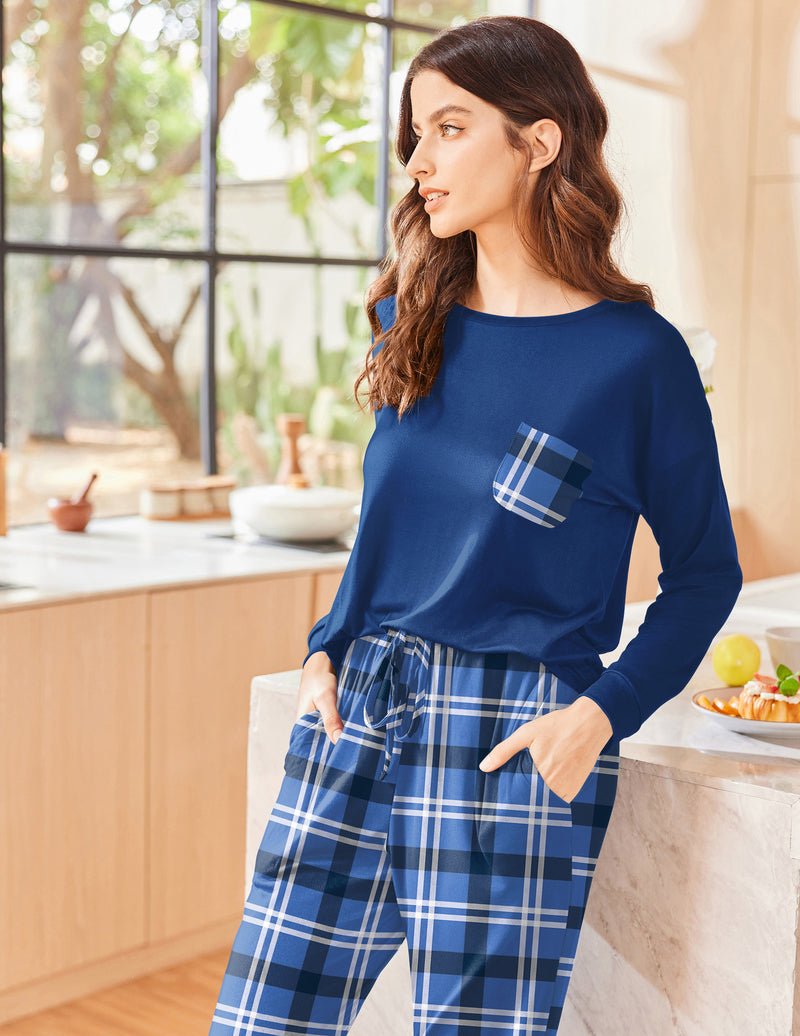 Blue long sleeve pajama set with blue-and-white plaid pants and pocket
