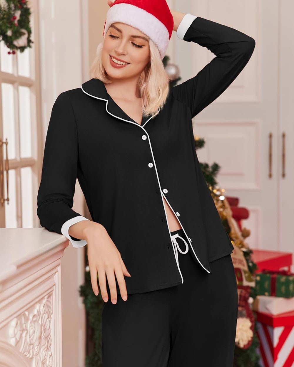 Black long-sleeve button-down lounge set with contrast trim, side slit detail, and matching pants