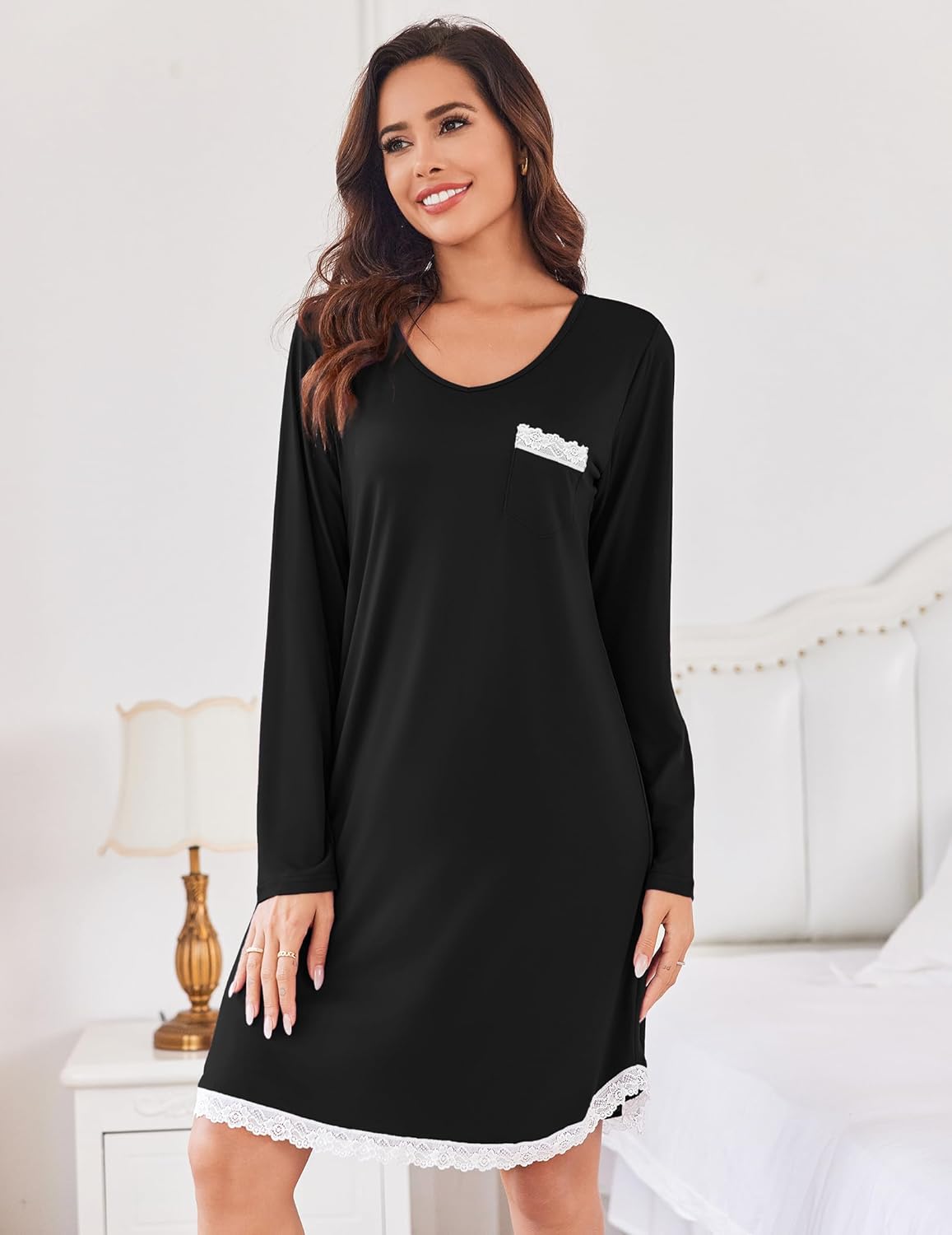 Black long sleeve V-neck nightgown with white lace-trimmed hem and chest pocket