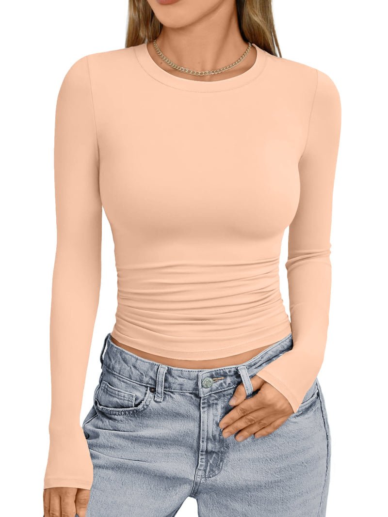 Light beige long-sleeve thermal underwear top with crew neck and gathered waist