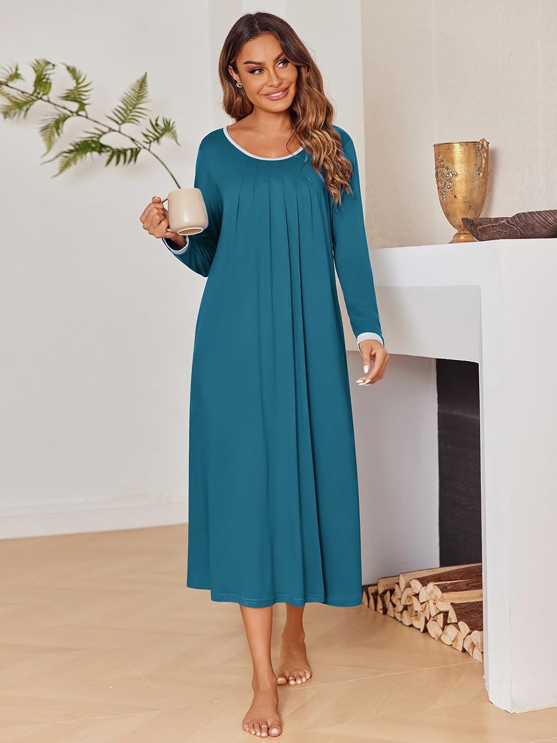Blue-green long-sleeve sleep dress with round neckline and gathered pleats