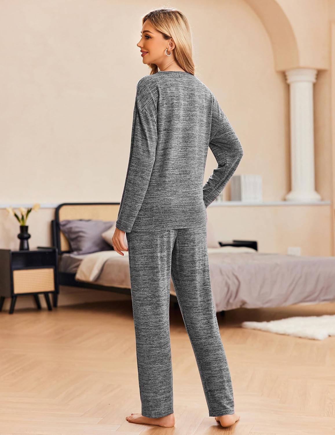 Gray pajama lounge set with long sleeves and fitted pants, rear profile