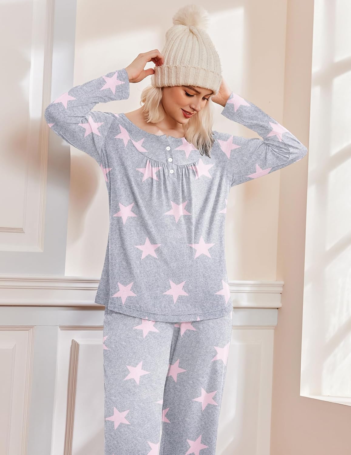 Grey long-sleeve pajama set with pink star pattern and button front