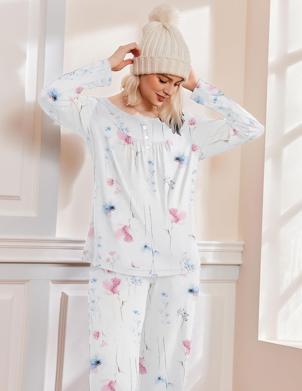 White floral pajama set with long sleeves, button front, and matching pants