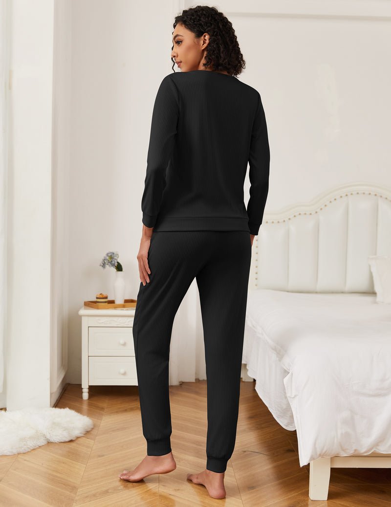 Black long-sleeve pajama set with jogger pants, back view