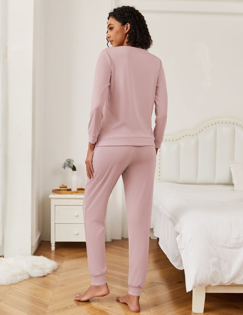 Light pink lounge pajama set with long-sleeve top and jogger pants, rear view.