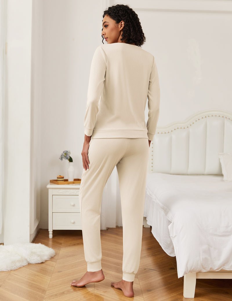 Cream khaki lounge pajama set with long-sleeve top and jogger pants, rear view.
