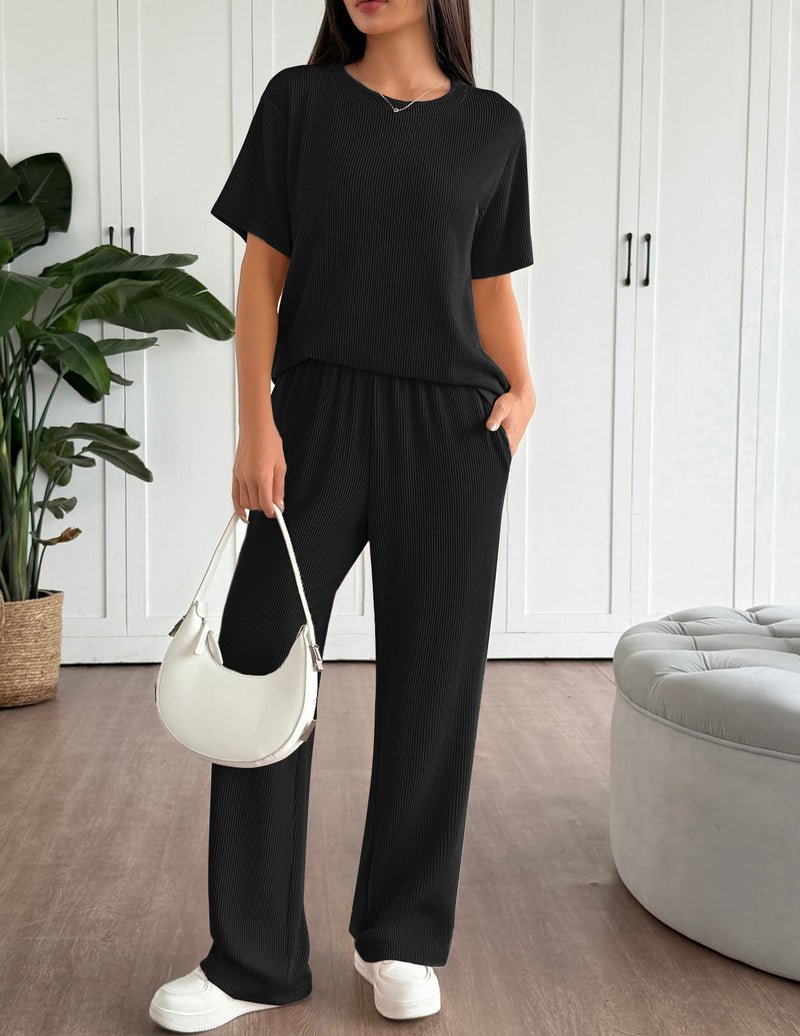 Black lounge set: short-sleeve pullover and matching wide-leg pants with elastic waist
