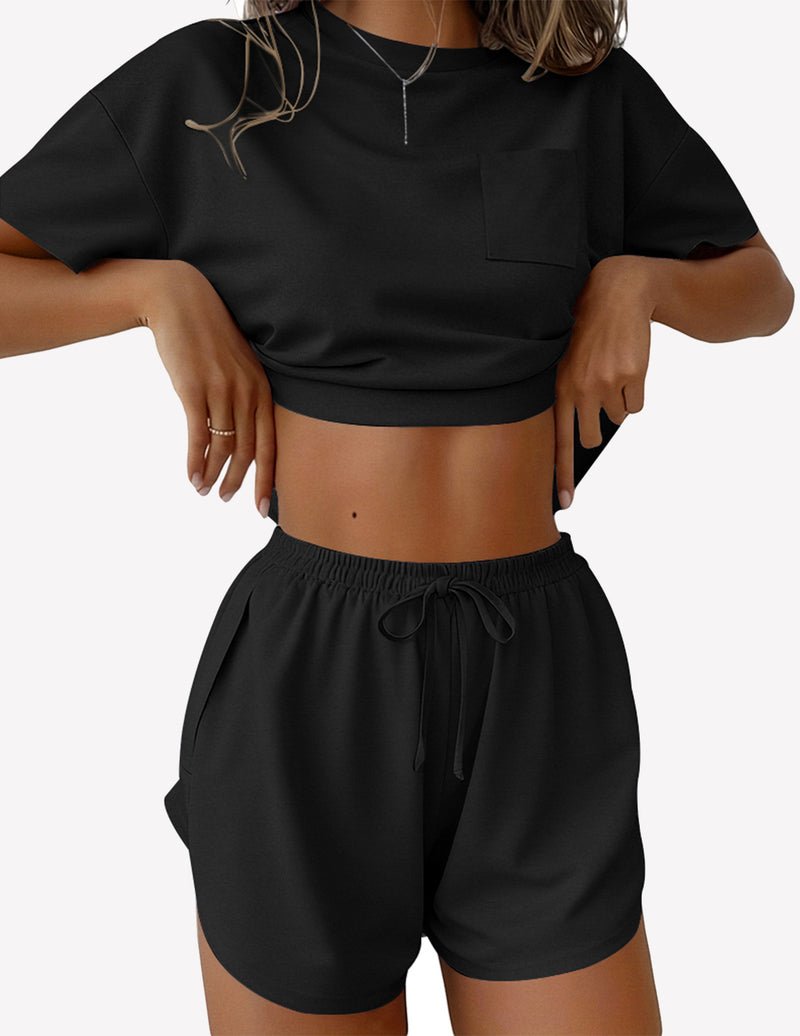 Black 2-piece lounge set with short sleeve crop top and elastic drawstring shorts