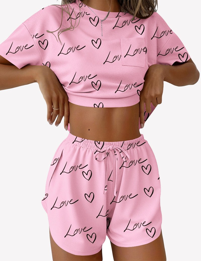 Pink graphic “Love” print 2-piece lounge set with crop top and drawstring shorts
