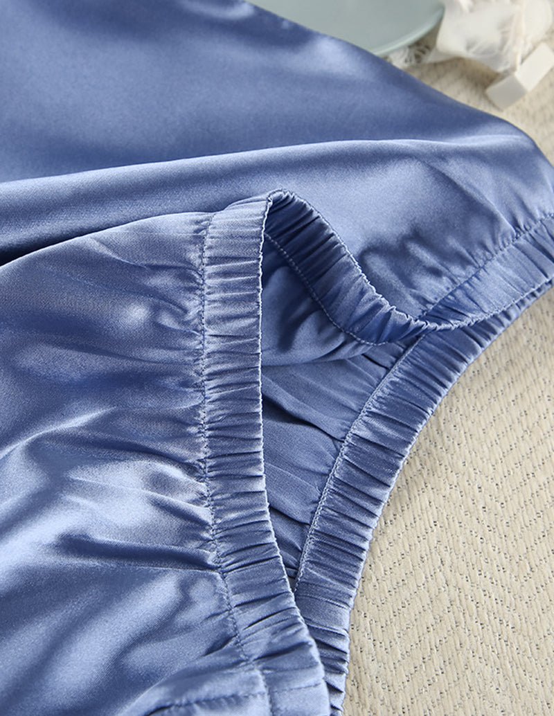 Blue satin pajama sleeve cuff with ruched elastic edge