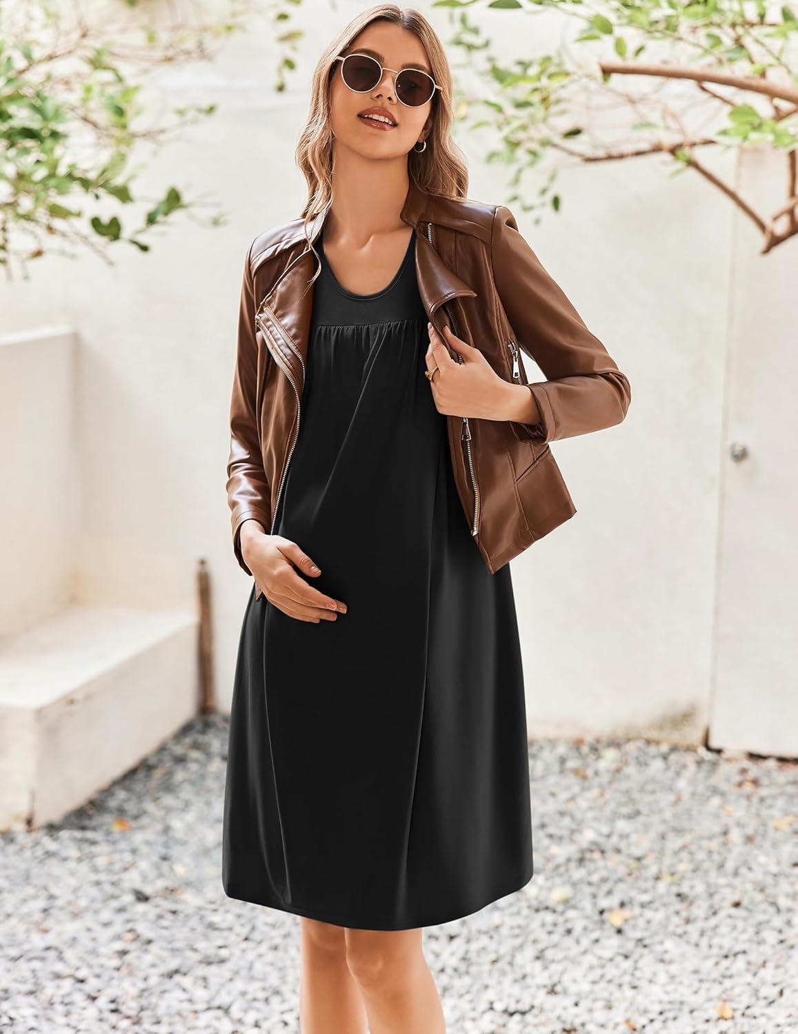 Black maternity nursing nightgown dress, sleeveless knee-length with gathered front.