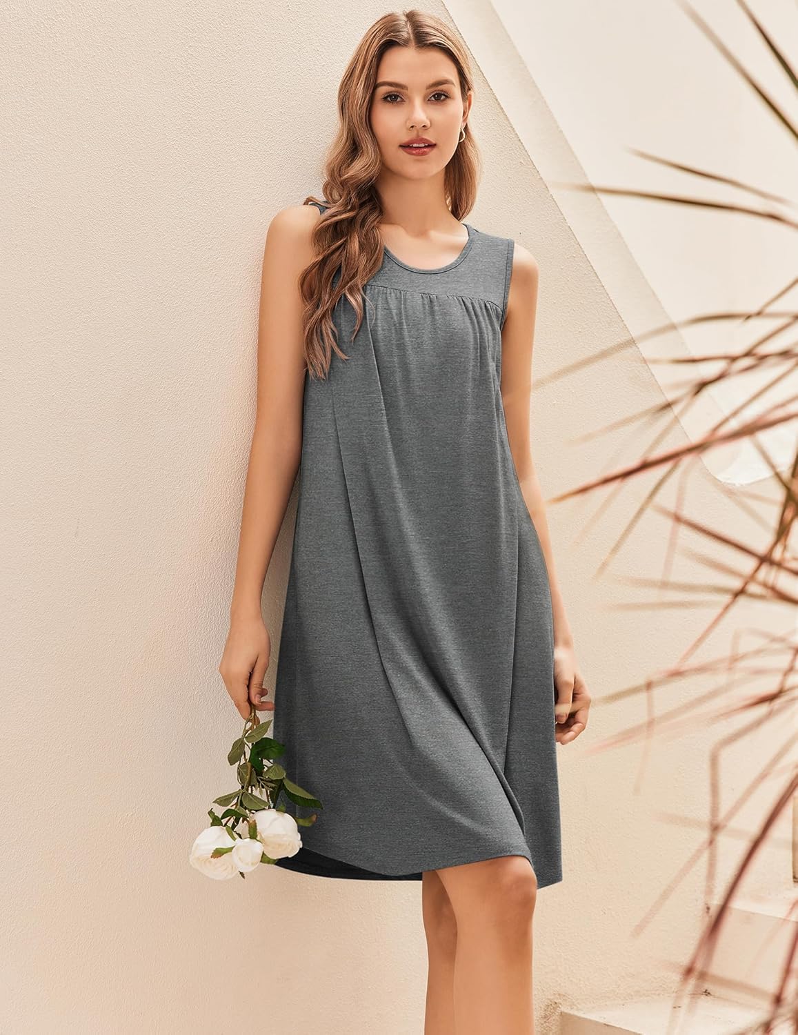 Maternity nursing nightgown dress in steel gray, sleeveless scoop neck with draped skirt.