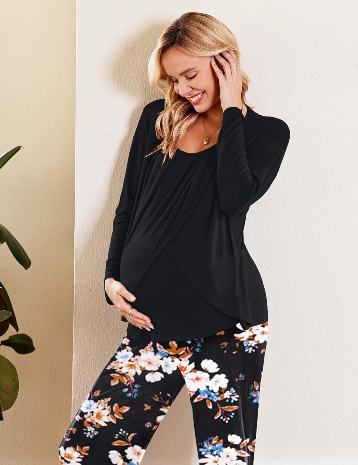 Black long-sleeve nursing pajama top with floral print pants in dark multicolor