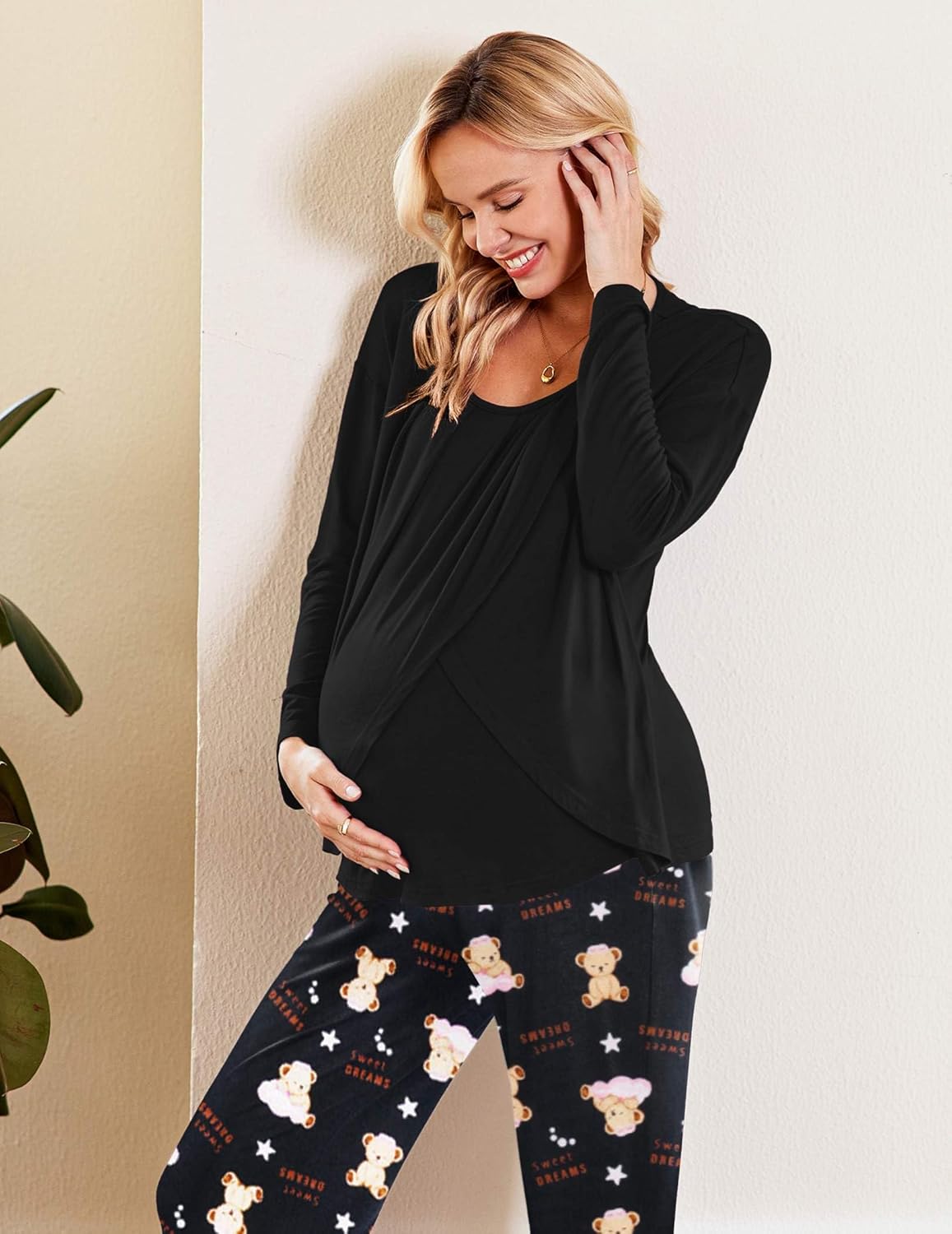 Black nursing pajama set with long sleeves: top with nursing flap and teddy-star pants