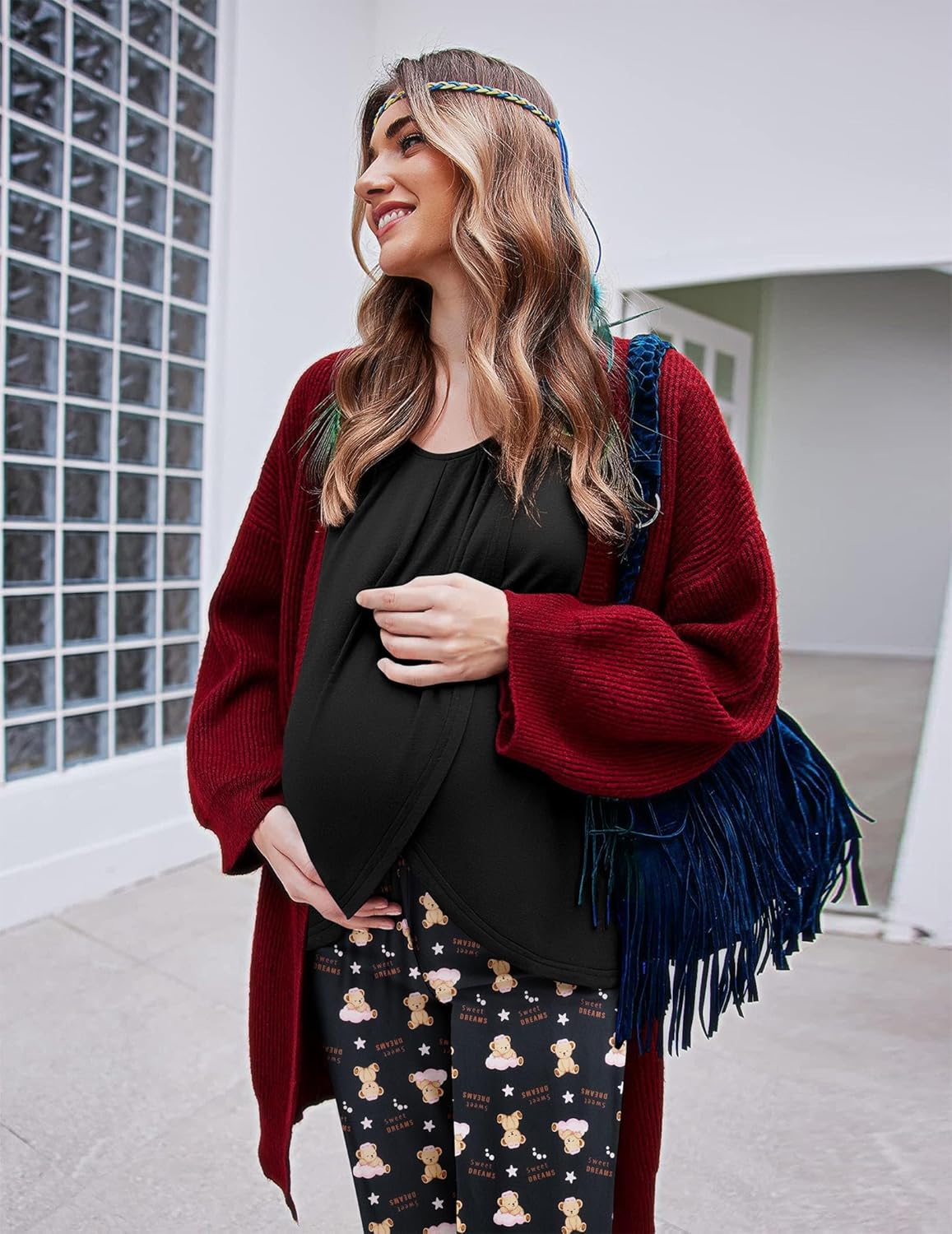 Black maternity nursing pajama set: long-sleeve top with crossover nursing panel, printed pants