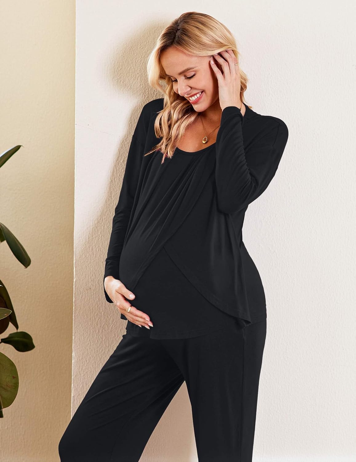 Black long-sleeve nursing pajama top with drape fit and matching solid black pants