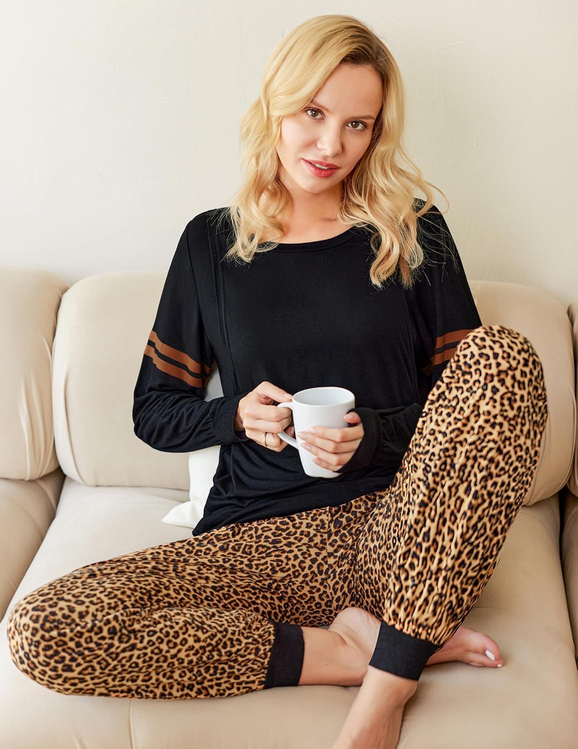 Maternity pajama set: black nursing top with long sleeves and leopard-print pants